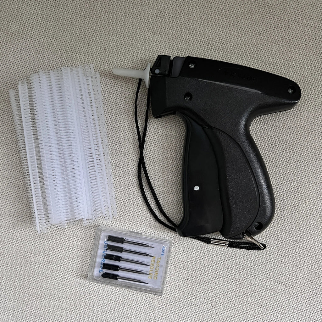 Quick Clothing Fixer(1 Set consists of glue needles (1000) +6 gun needles + a tag gun)