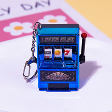 Load image into Gallery viewer, Rotating Fruit Machine Shaped Keychain