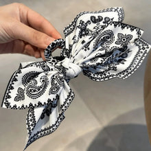 Load image into Gallery viewer, Double-Sided Paisley Bow Hair Claw
