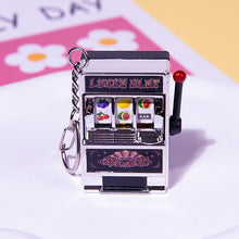 Load image into Gallery viewer, Rotating Fruit Machine Shaped Keychain