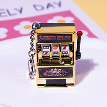 Load image into Gallery viewer, Rotating Fruit Machine Shaped Keychain