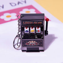 Load image into Gallery viewer, Rotating Fruit Machine Shaped Keychain