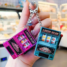 Load image into Gallery viewer, Rotating Fruit Machine Shaped Keychain