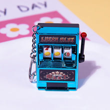 Load image into Gallery viewer, Rotating Fruit Machine Shaped Keychain