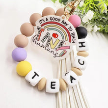 Load image into Gallery viewer, Creative Letter Pattern Silicone Bracelet Keychain