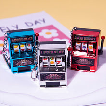 Load image into Gallery viewer, Rotating Fruit Machine Shaped Keychain