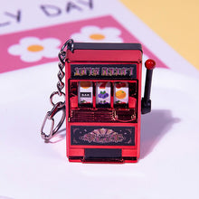 Load image into Gallery viewer, Rotating Fruit Machine Shaped Keychain
